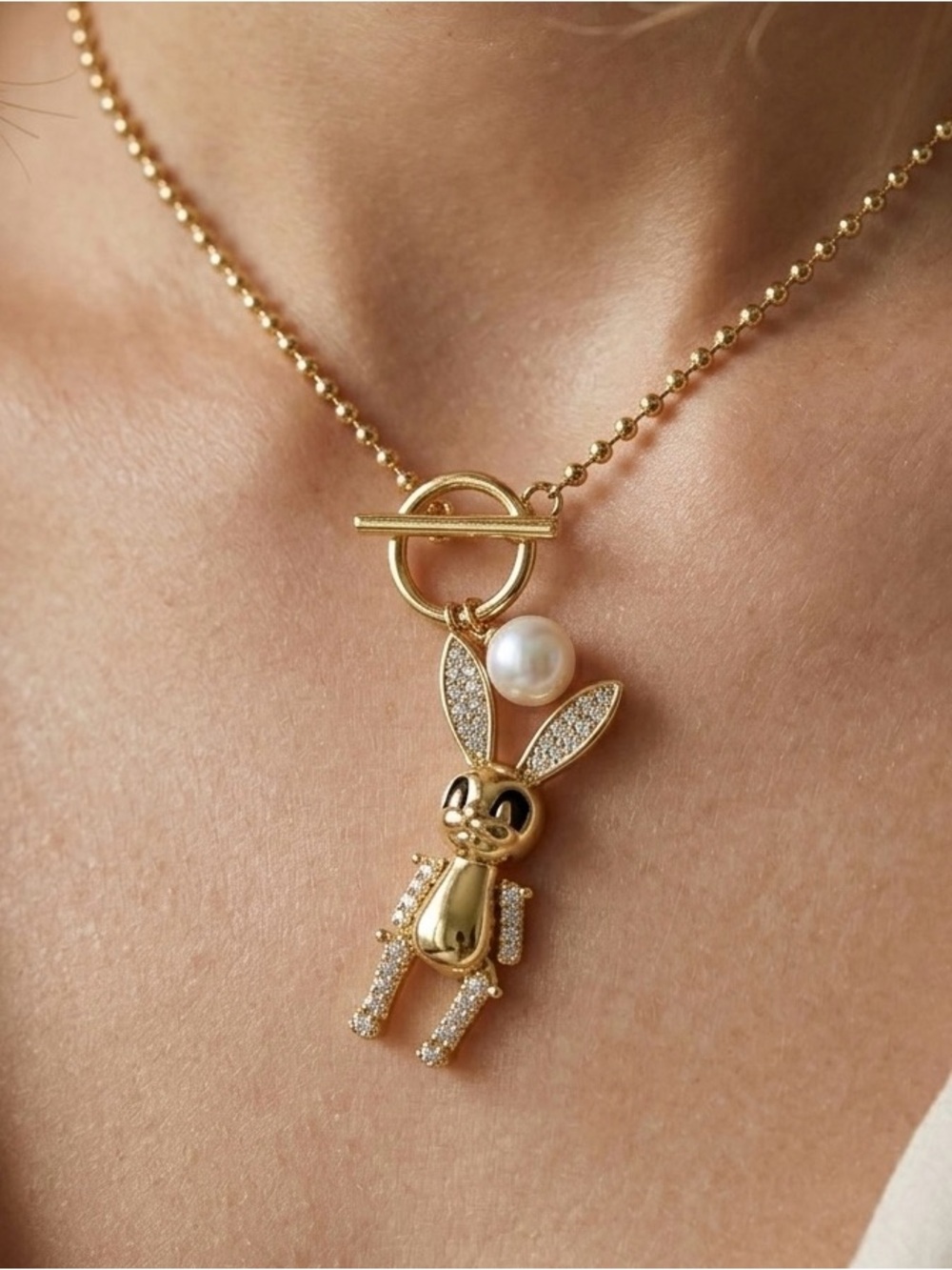 Gold Bunny Pendant Necklace with Pearl Accent